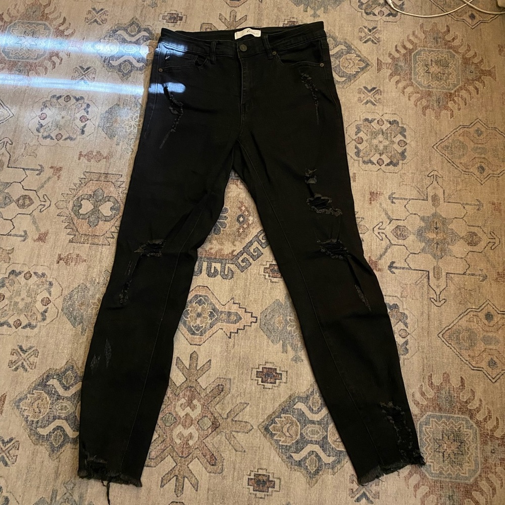 black ripped jeans